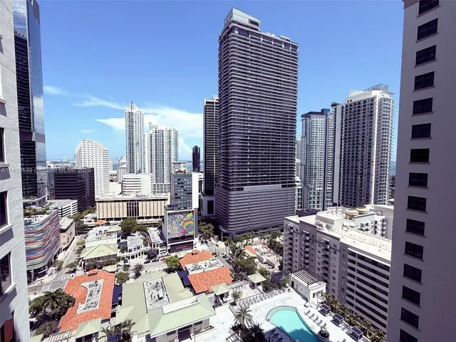 a view of a patio with swimming pool