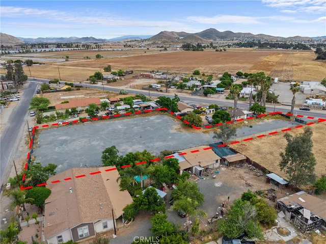 an aerial view of houses with outdoor space