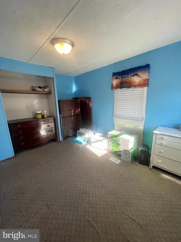 a room with furniture and a window