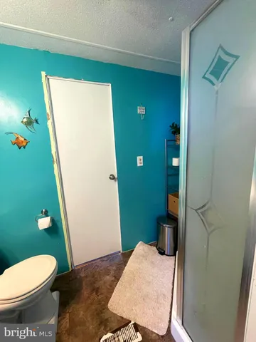 a bathroom with a sink and toilet