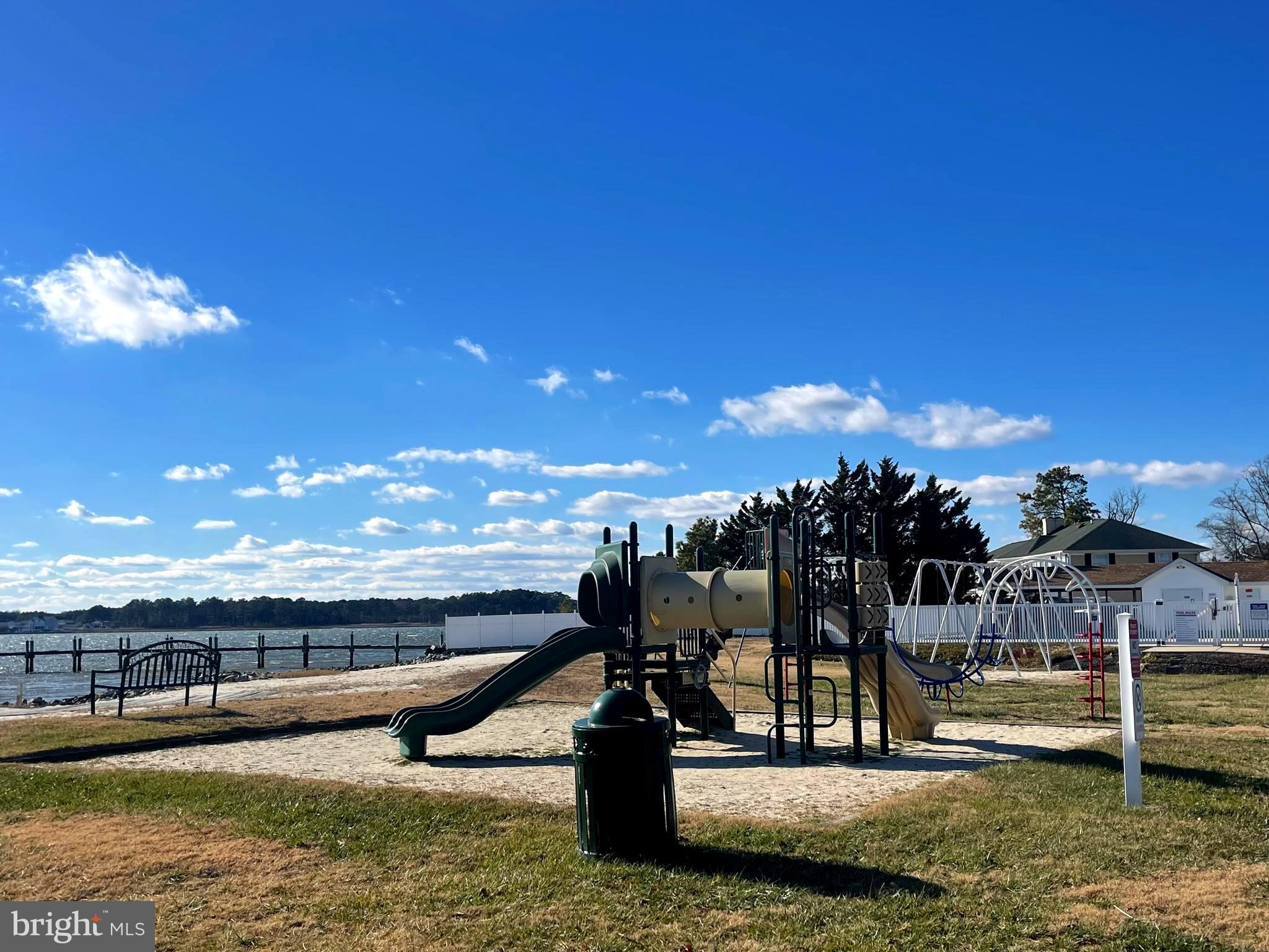 21720 B Street Rehoboth Beach, DE 19971 - Photo 18 of 23 a view of a swimming pool with an outdoor seating
