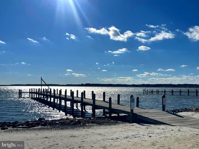 a view of swimming pool with outdoor seating