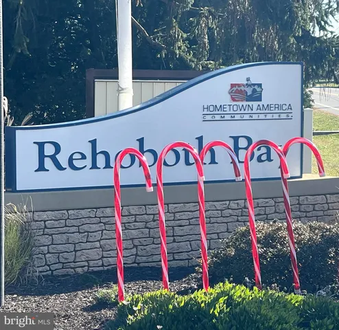 a street sign that is on a wall