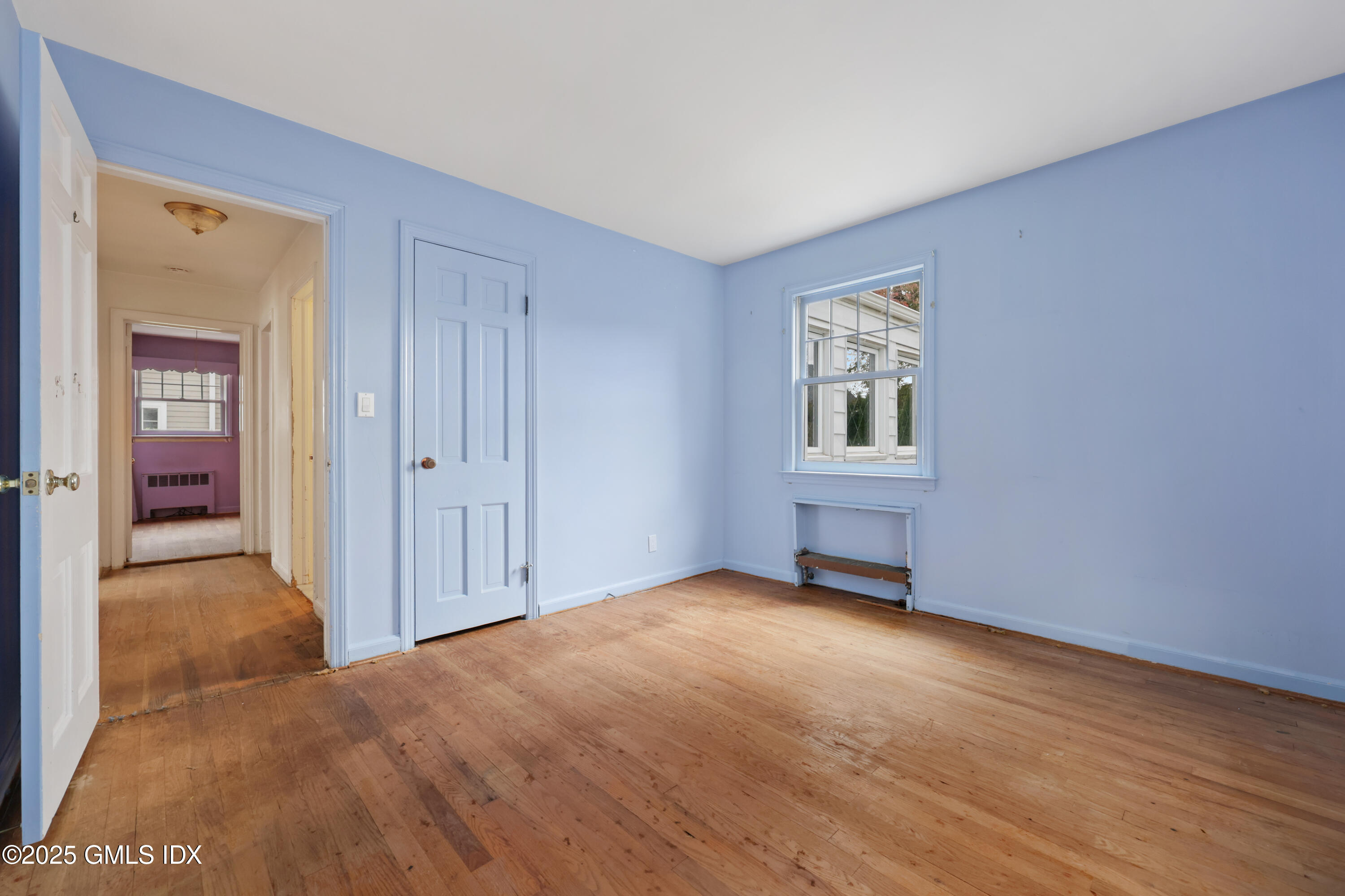 17 Meadow Drive Cos Cob, CT 06807 - Photo 6 of 23 a view of an empty room with window and closet area