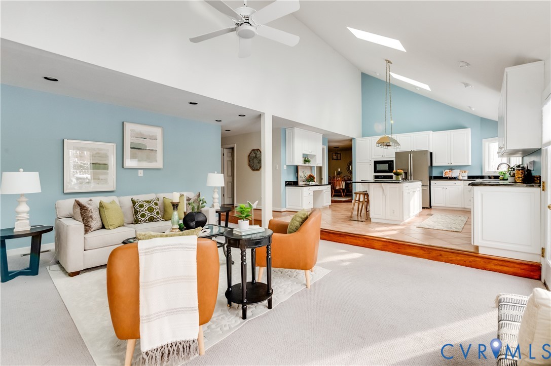 1707 Devon Way Manakin-Sabot, VA 23103 - Photo 14 of 37 Sunlit family room with plush carpeting and seamle