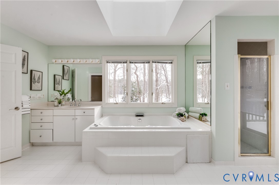 1707 Devon Way Manakin-Sabot, VA 23103 - Photo 19 of 37 Windows show wooded views, while the skylight offe