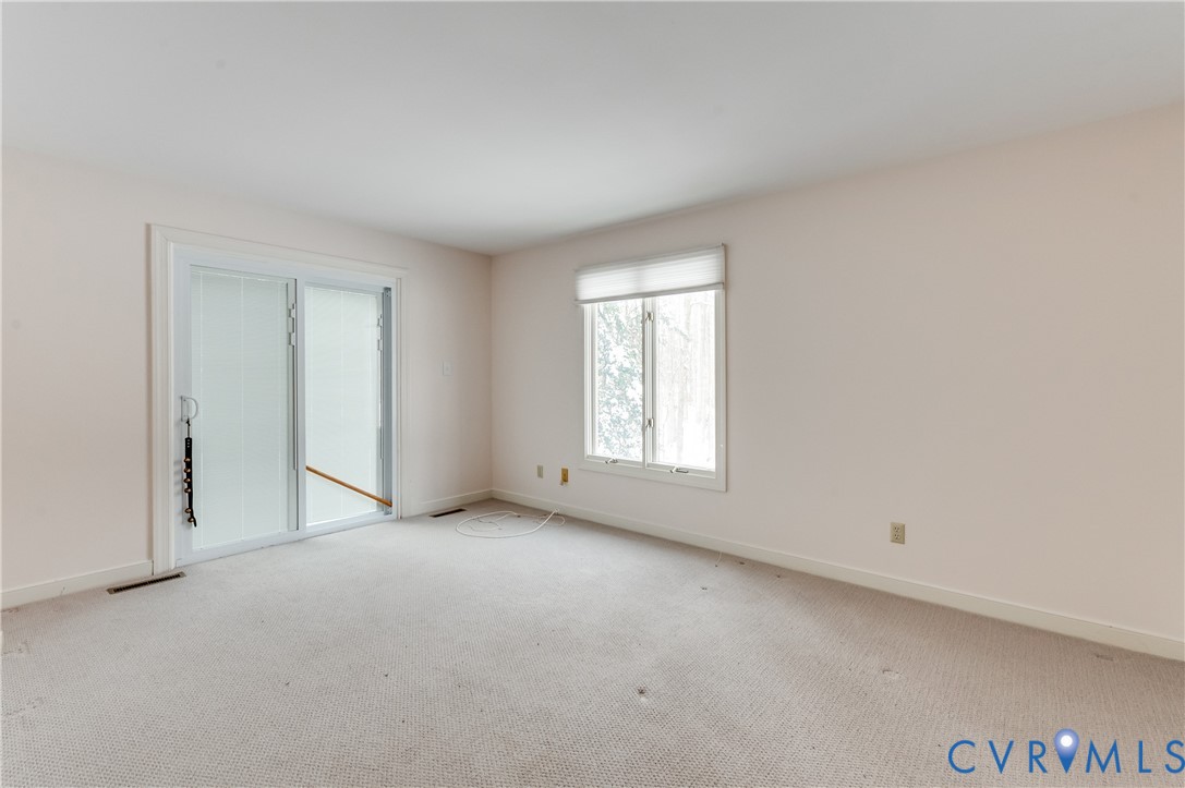 1707 Devon Way Manakin-Sabot, VA 23103 - Photo 28 of 37 Generously sized bedroom with carpet and private d