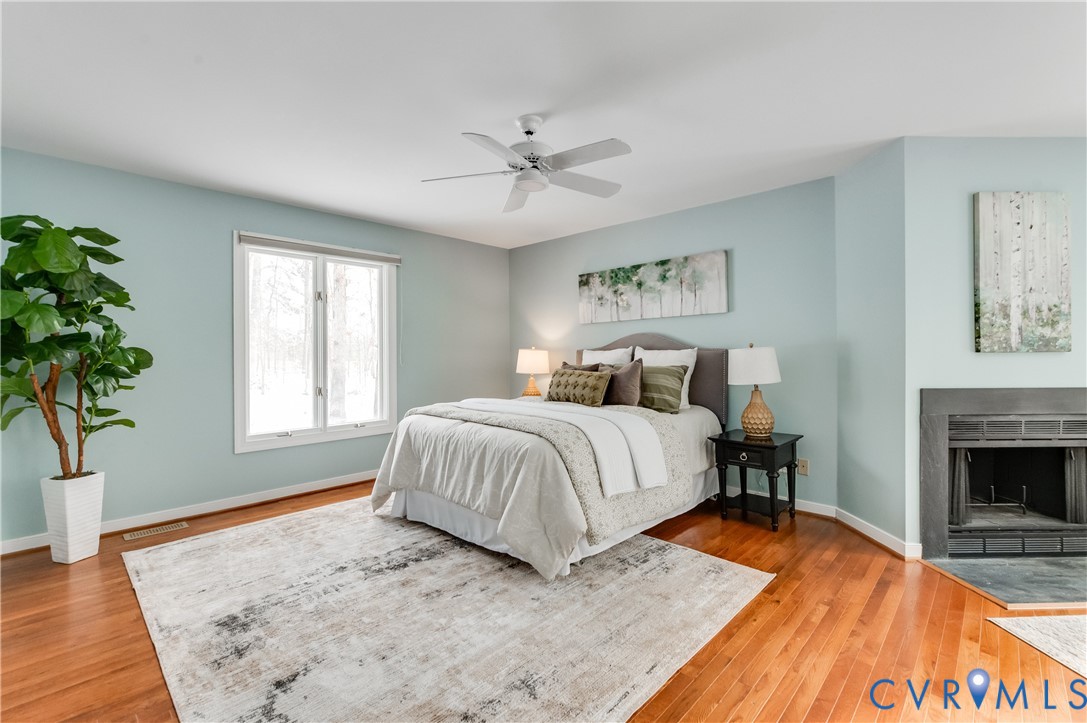 1707 Devon Way Manakin-Sabot, VA 23103 - Photo 4 of 37 Expansive primary suite with a wood-burning firepl