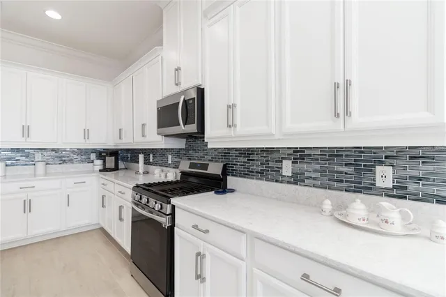 a front view of building with yard and green space