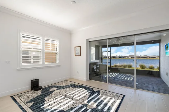 a view of a balcony with lake view and mountain view