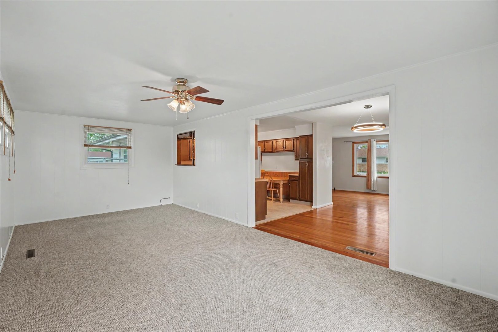 1605 Grange Drive Rantoul, IL 61866 - Photo 14 of 26 wooden floor in an empty room with a window