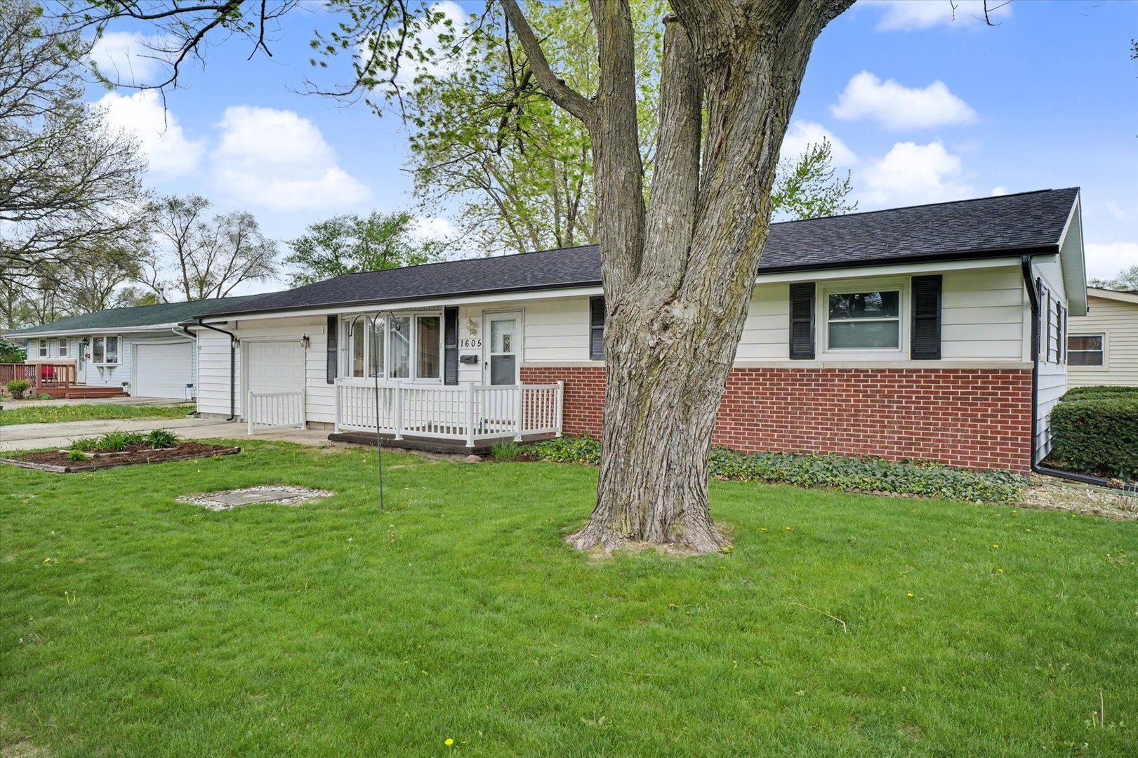 1605 Grange Drive Rantoul, IL 61866 - Photo 3 of 26 a view of a house with a backyard