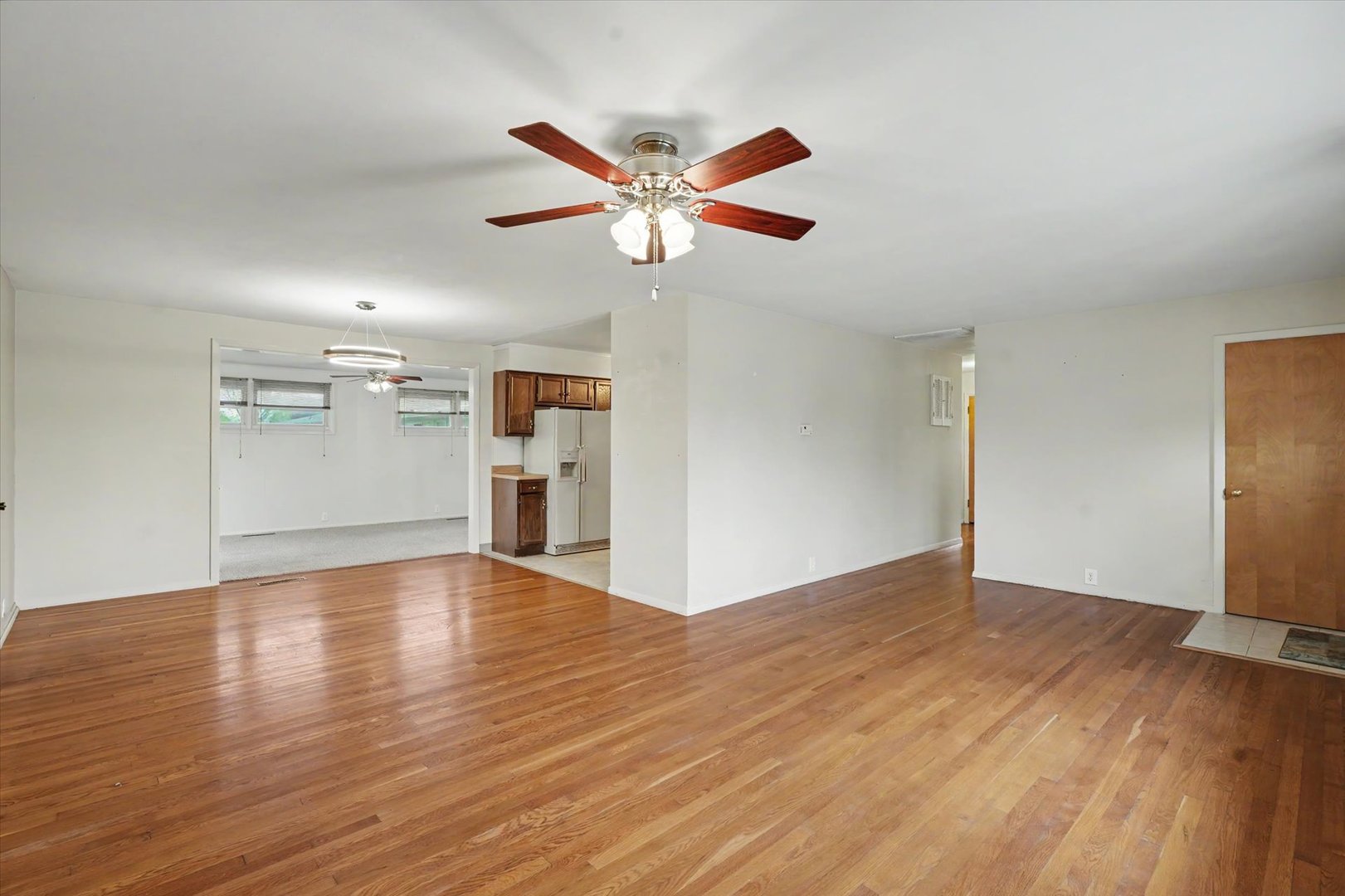 1605 Grange Drive Rantoul, IL 61866 - Photo 8 of 26 a view of empty room with wooden floor