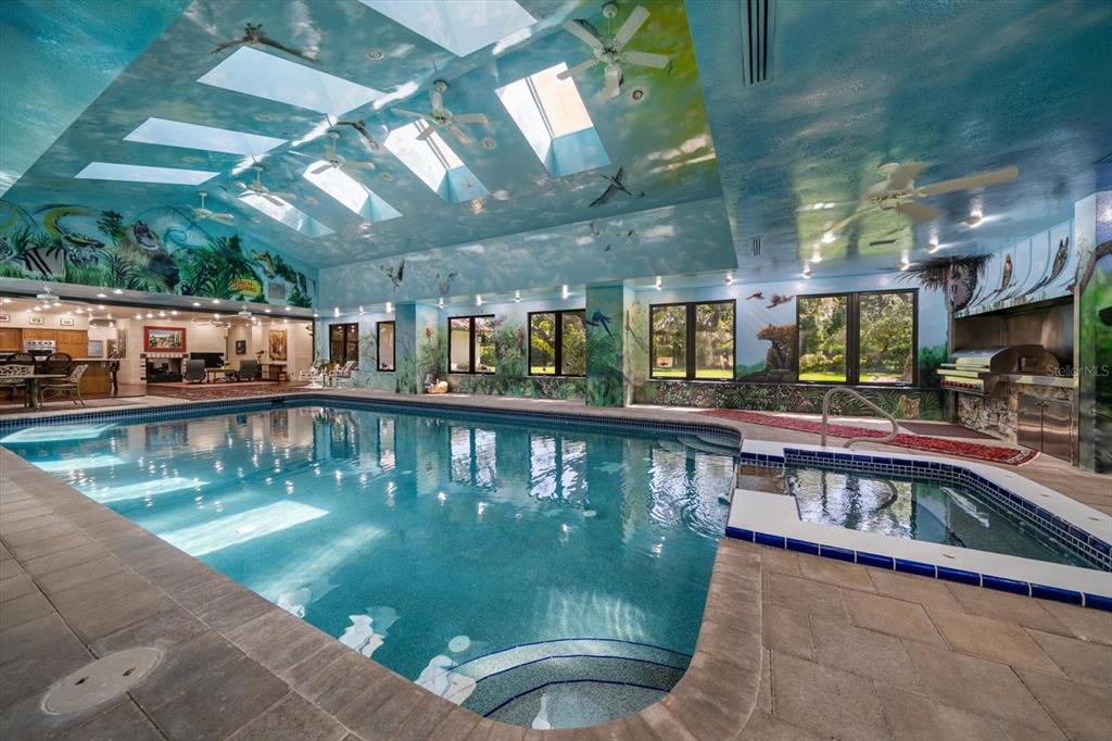 1835 Alicia Way Clearwater, FL 33764 - Photo 21 of 89 a view of a swimming pool with a patio