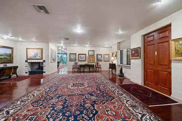 a kitchen with stainless steel appliances granite countertop a stove and a refrigerator