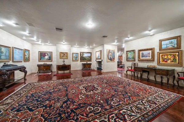 a kitchen with stainless steel appliances granite countertop a stove and a refrigerator