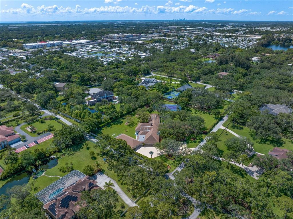 1835 Alicia Way Clearwater, FL 33764 - Photo 83 of 89 an aerial view of residential houses with outdoor space and trees