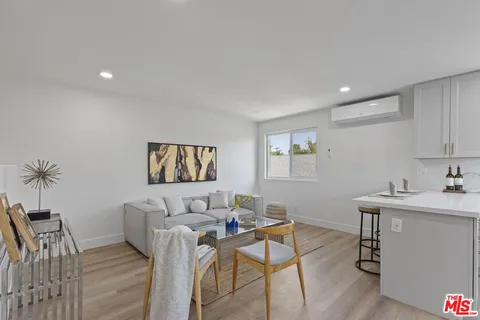 a workspace with furniture and wooden floor