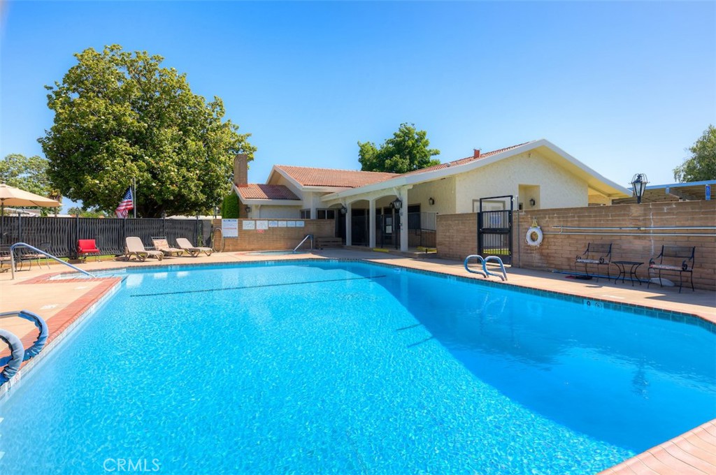 1901 Dayton Road, Unit 133 Chico, CA 95928 - Photo 35 of 36 a view of a house with pool and chairs