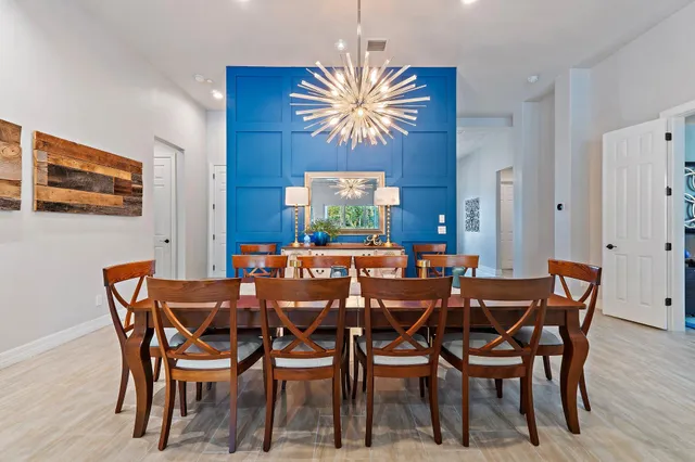 a spacious bedroom with a bed and a cabinets