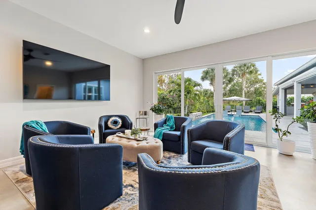 a view of a dining room with furniture window and outside view