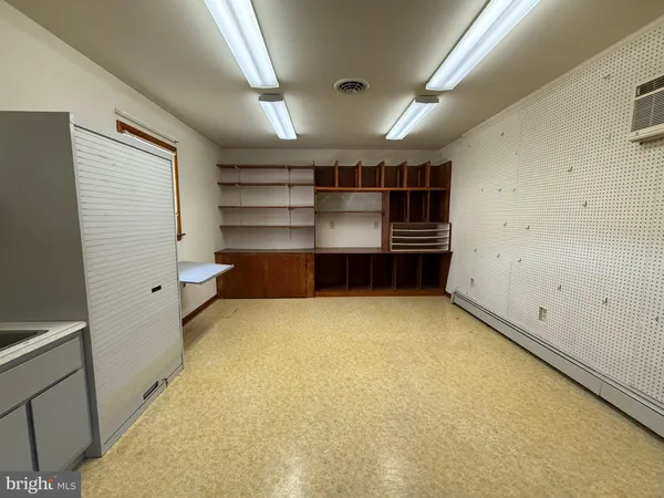 a view of room and a window
