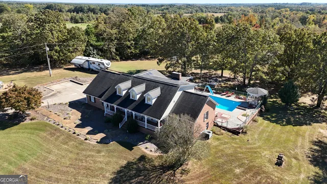 a view of roof deck with patio