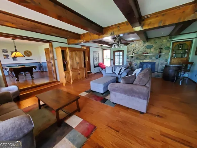 a living room with furniture and a window