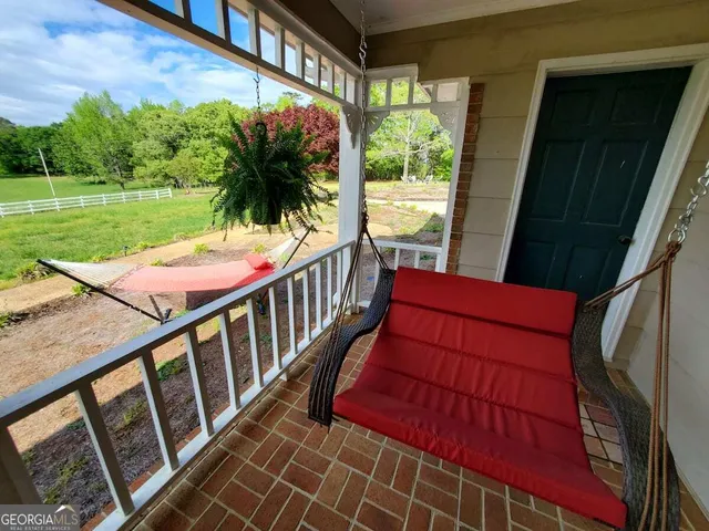 a room with furniture and a window
