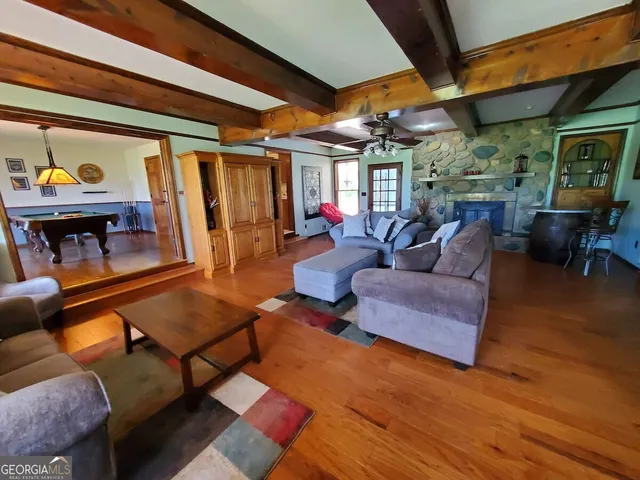 a kitchen with a sink a refrigerator and a stove