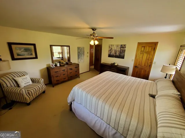 a kitchen sink with a countertop next to a window