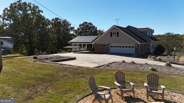 a view of a yard with a tree