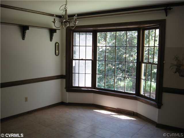 10930 Cherrybark Road Chester, VA 23831 - Photo 11 of 14 a view of an empty room with a window