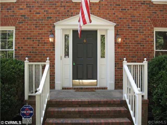 10930 Cherrybark Road Chester, VA 23831 - Photo 2 of 14 a front view of a house with entryway