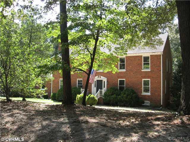 10930 Cherrybark Road Chester, VA 23831 - Photo 3 of 14 a view of a house with a tree in front