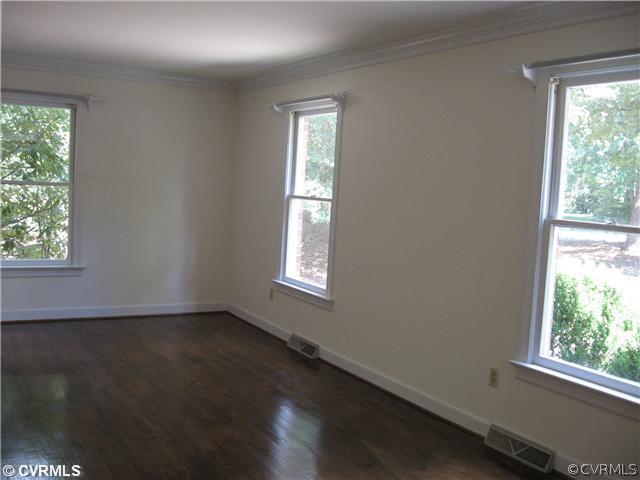 10930 Cherrybark Road Chester, VA 23831 - Photo 7 of 14 an empty room with a window