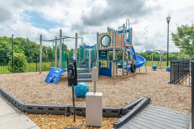 swimming pool view with sitting space and garden view