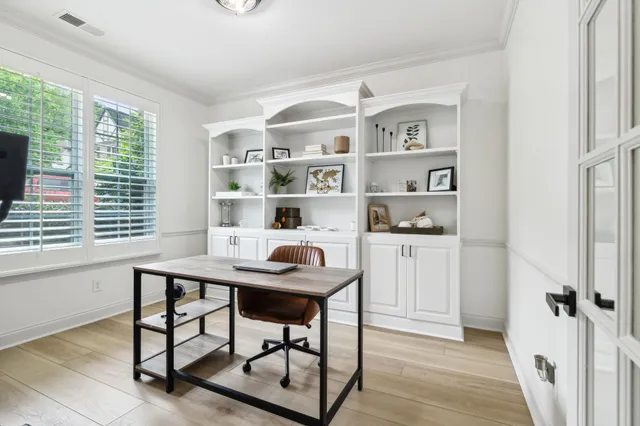 a workspace with furniture and window