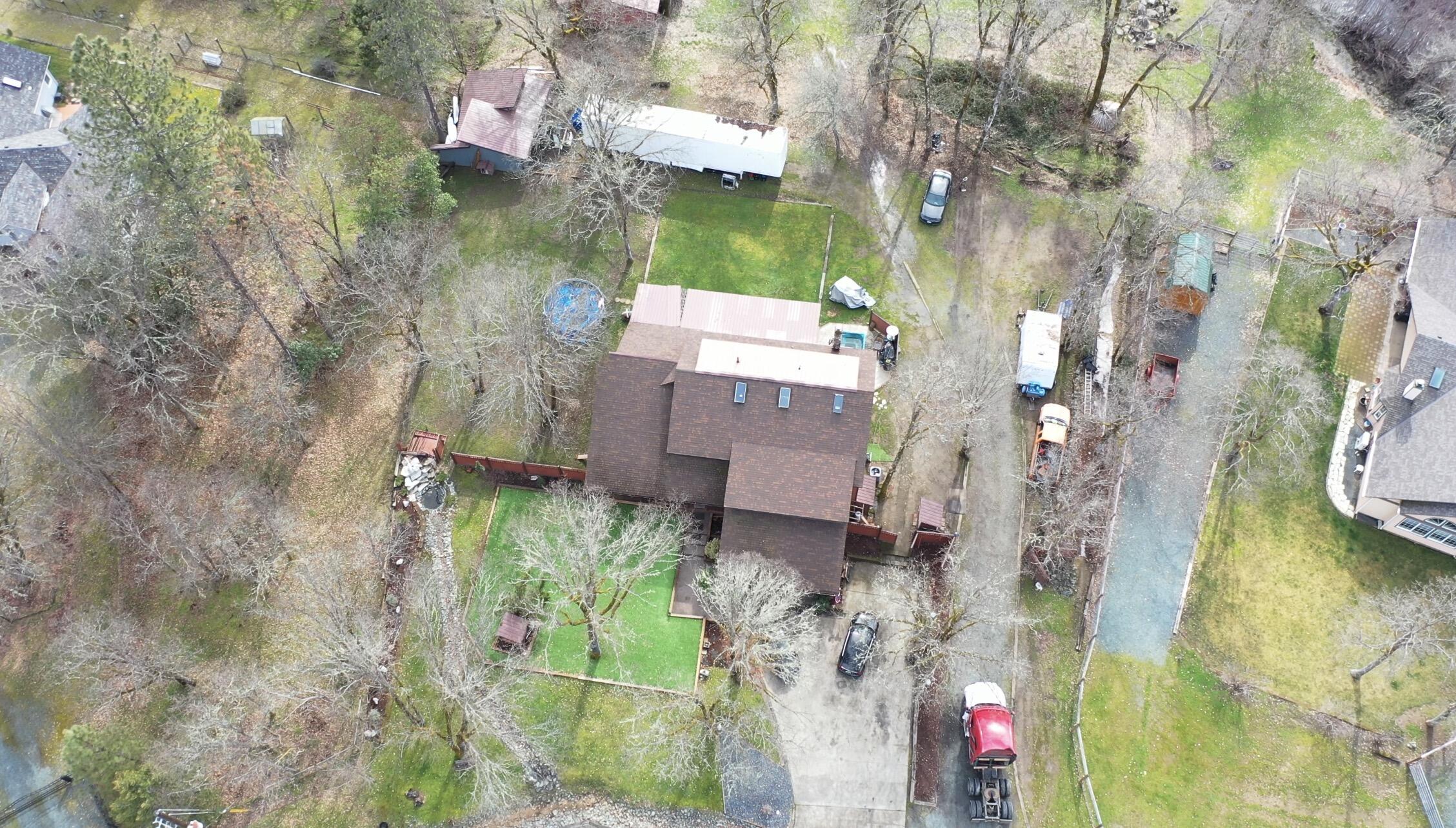 255 Barker Drive Merlin, OR 97532 - Photo 13 of 26 an aerial view of residential houses with outdoor space