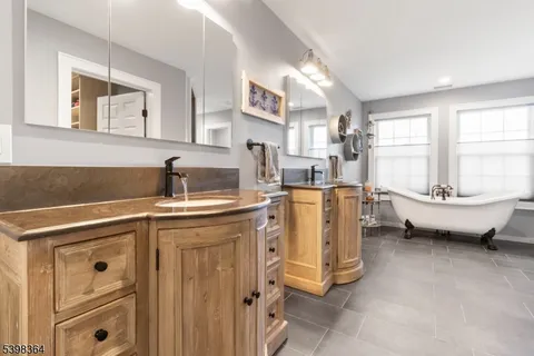 a kitchen with cabinets and window