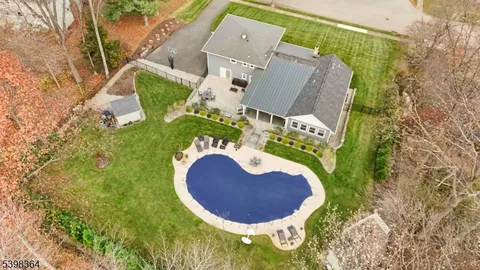 an aerial view of a house having yard