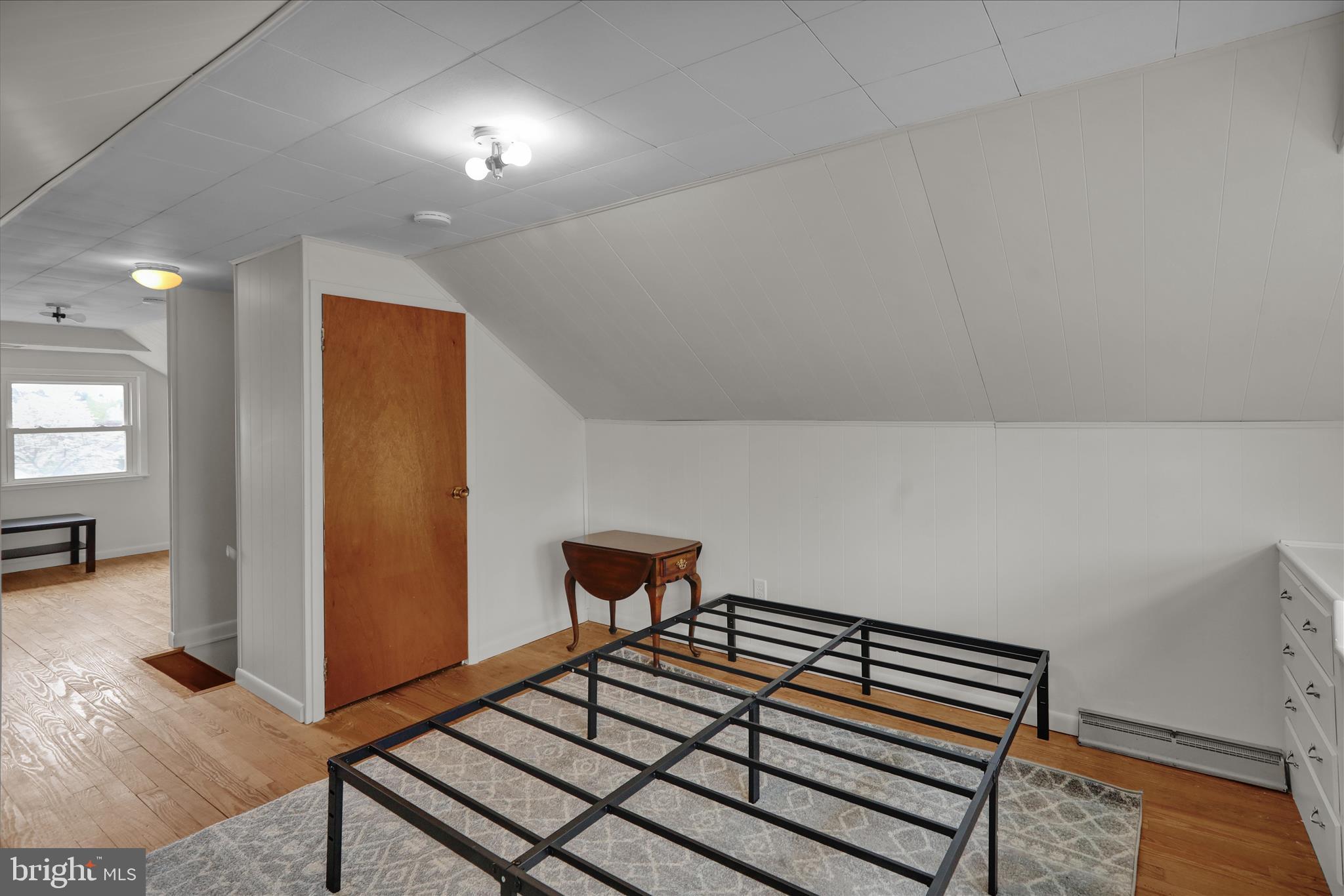 3357 Sheidy Avenue Reading, PA 19605 - Photo 20 of 31 wooden floor in an empty room with a window