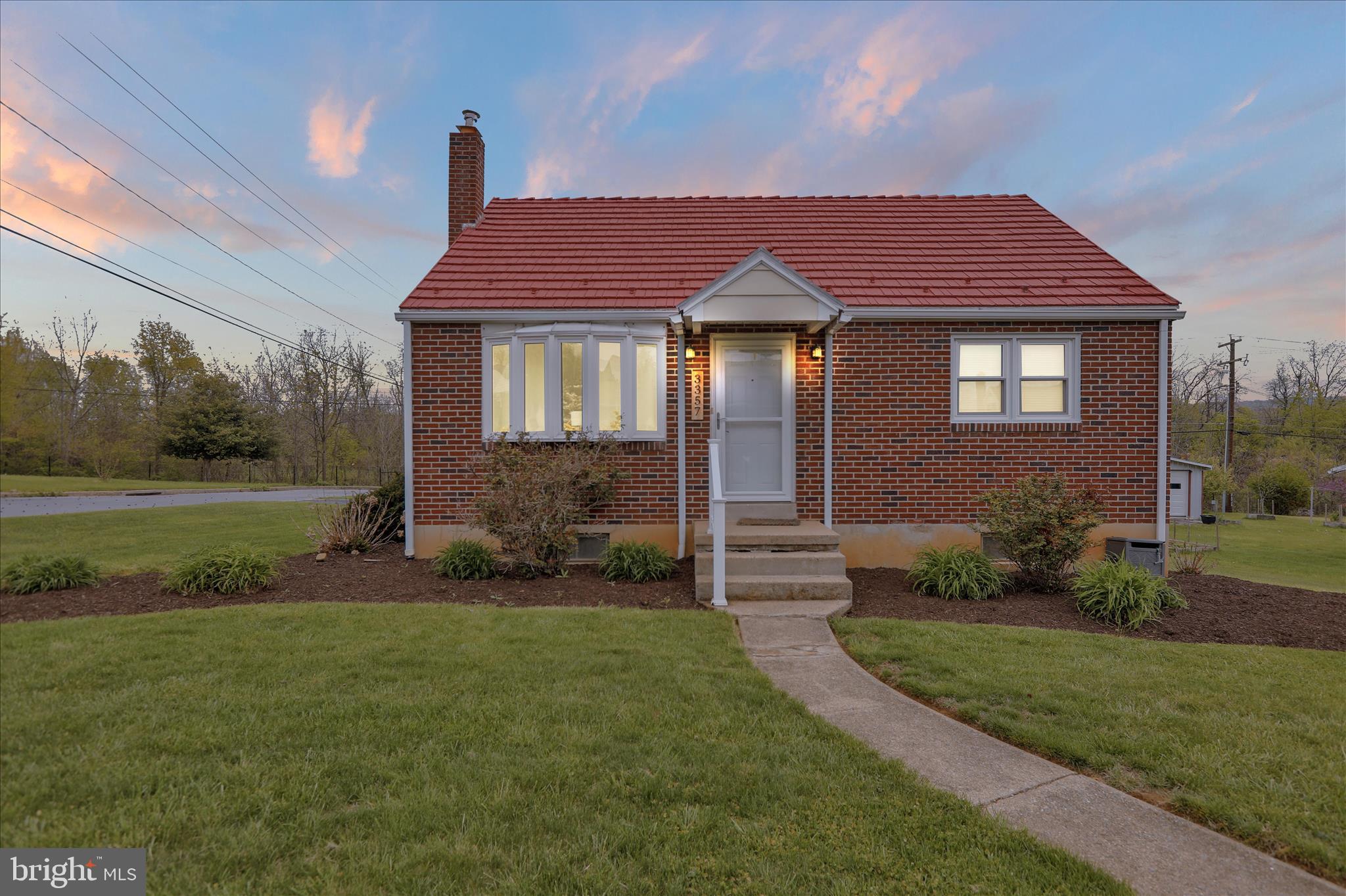 3357 Sheidy Avenue Reading, PA 19605 - Photo 2 of 31 a front view of a house with a yard
