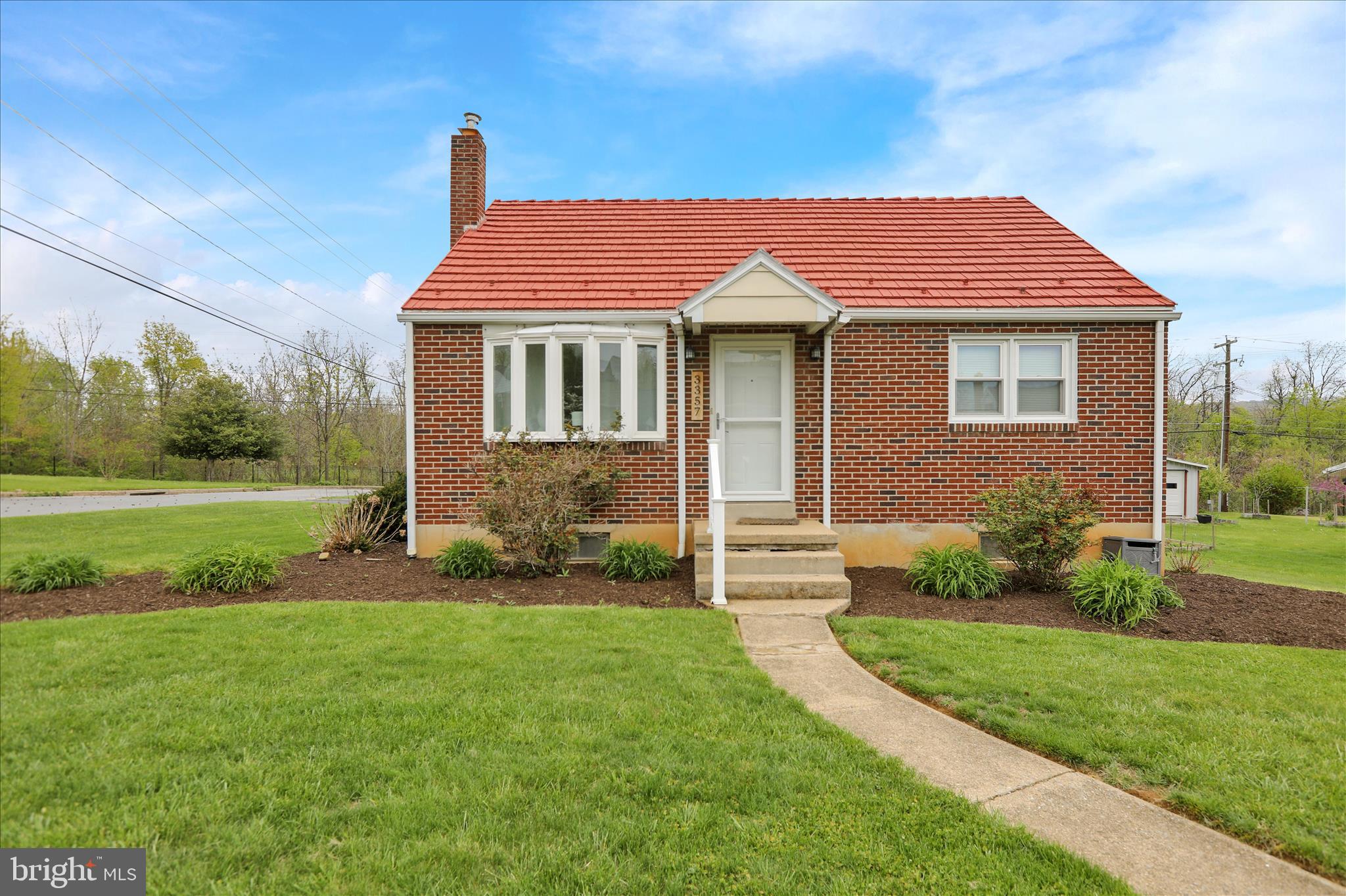 3357 Sheidy Avenue Reading, PA 19605 - Photo 3 of 31 a front view of a house with a yard