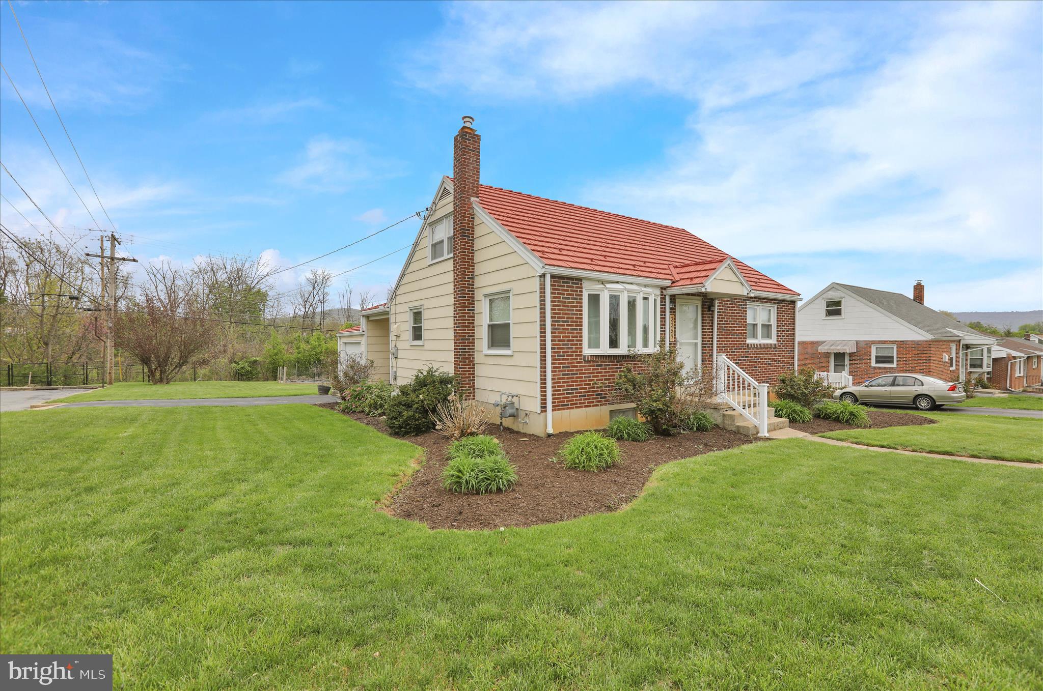 3357 Sheidy Avenue Reading, PA 19605 - Photo 4 of 31 a view of a house with a big yard and potted plants