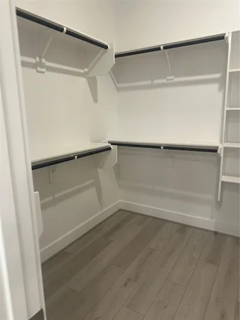 a view of an empty walk in closet