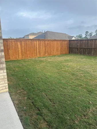 a view of a backyard with a garden