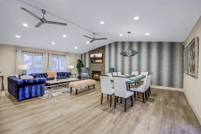 a kitchen with a refrigerator sink and cabinets