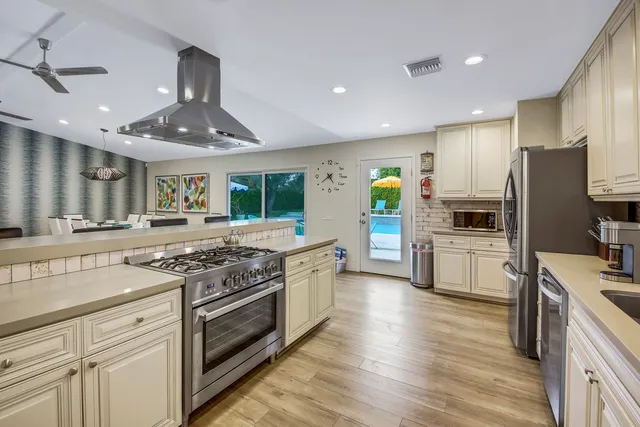 a bed room with a bed and a flat screen tv
