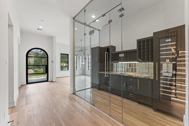 a kitchen with stainless steel appliances a refrigerator and a sink